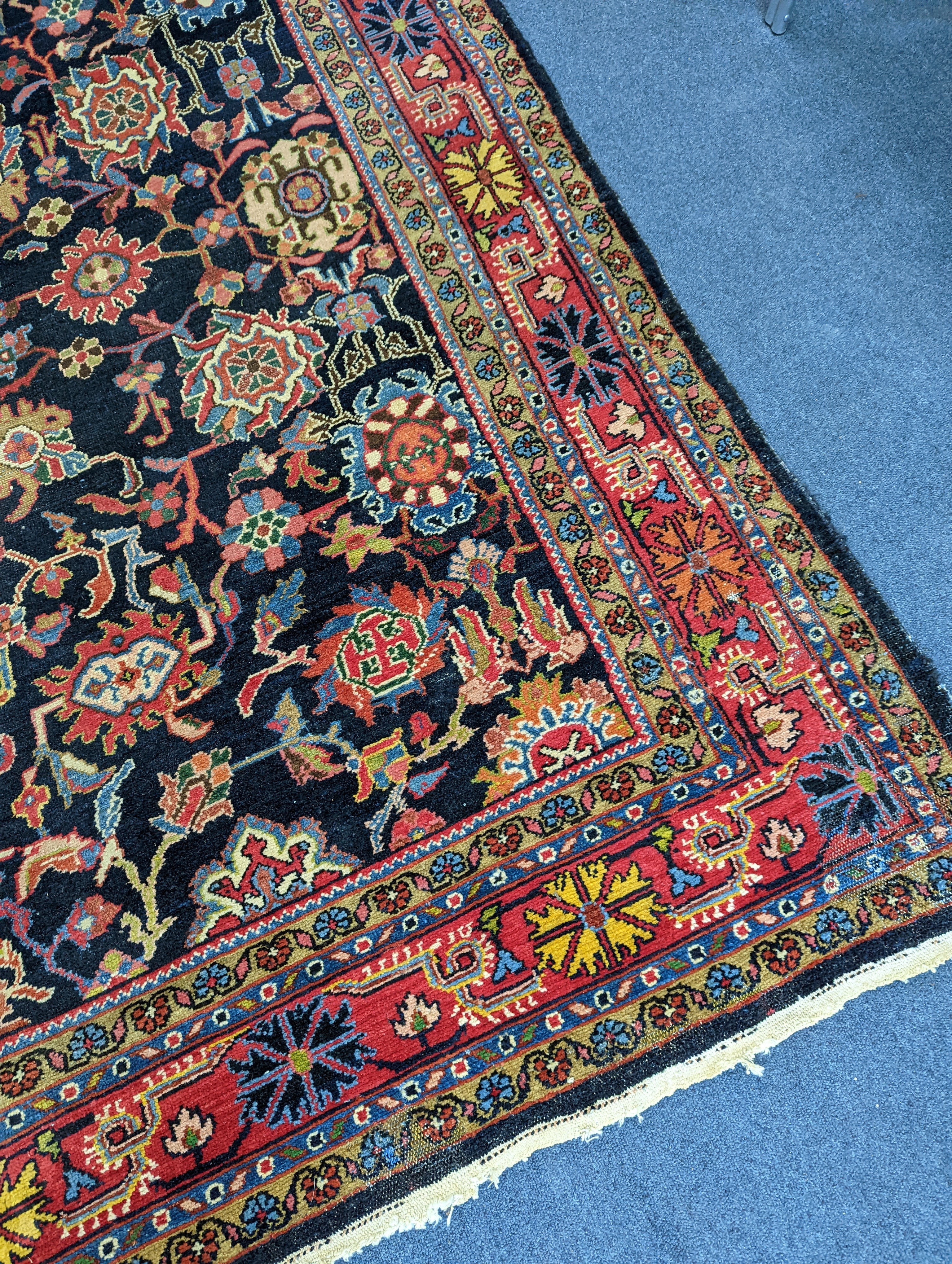 A Heriz / Moghal blue ground carpet, 340 x 206cm